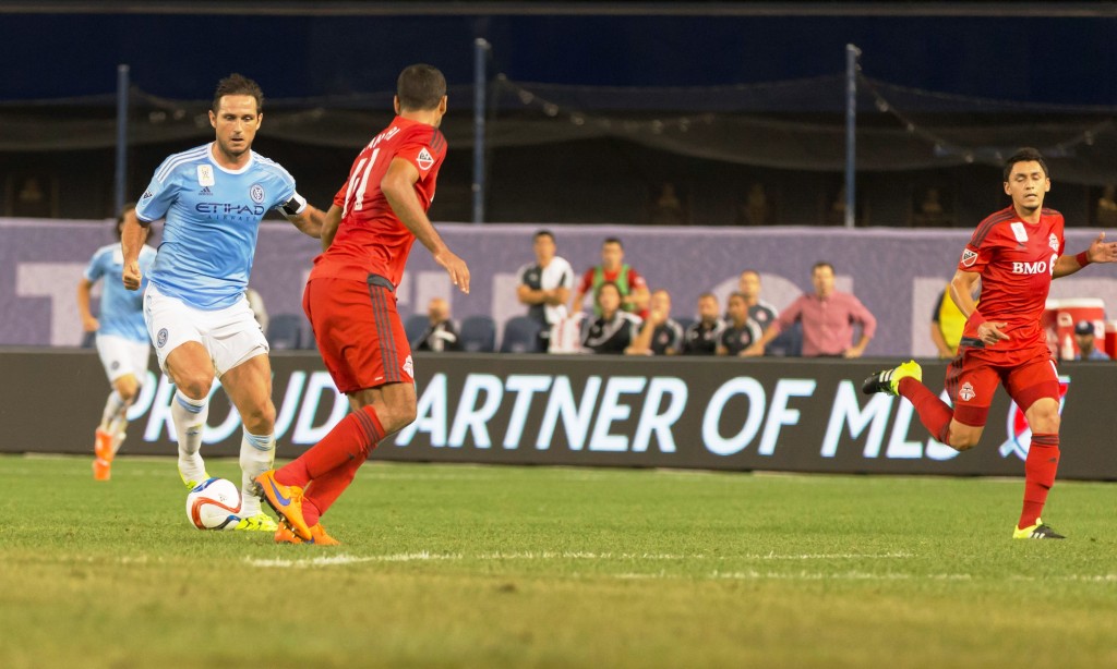 New York, NY - September 16, 2015: Frank Lampard (8) of NYC FC controls ball during game between New York City FC and Toronto FC at Yankee Stadium